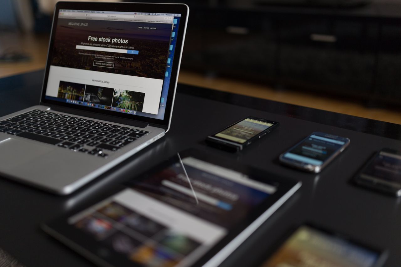 our-story A contemporary workspace showcasing a laptop, tablet, and smartphones, ideal for tech and freelance use.